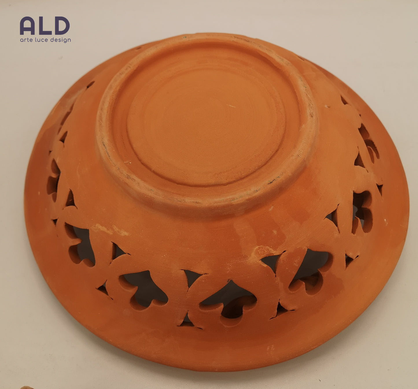 Centro tavola traforato portafrutta da cucina in terracotta grezza da decorare