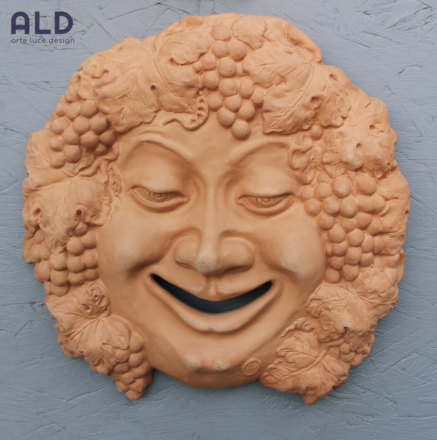 Bacco dio del vino in terracotta fregio da parete decorazione da interno esterno