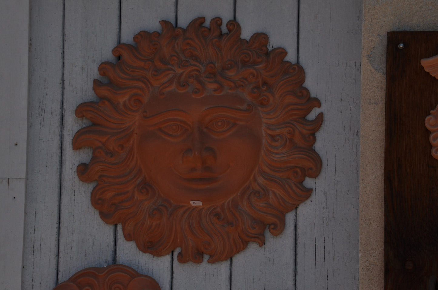 Decorazione da parete Sole in terracotta grezza rossa  da porta  fregio murale