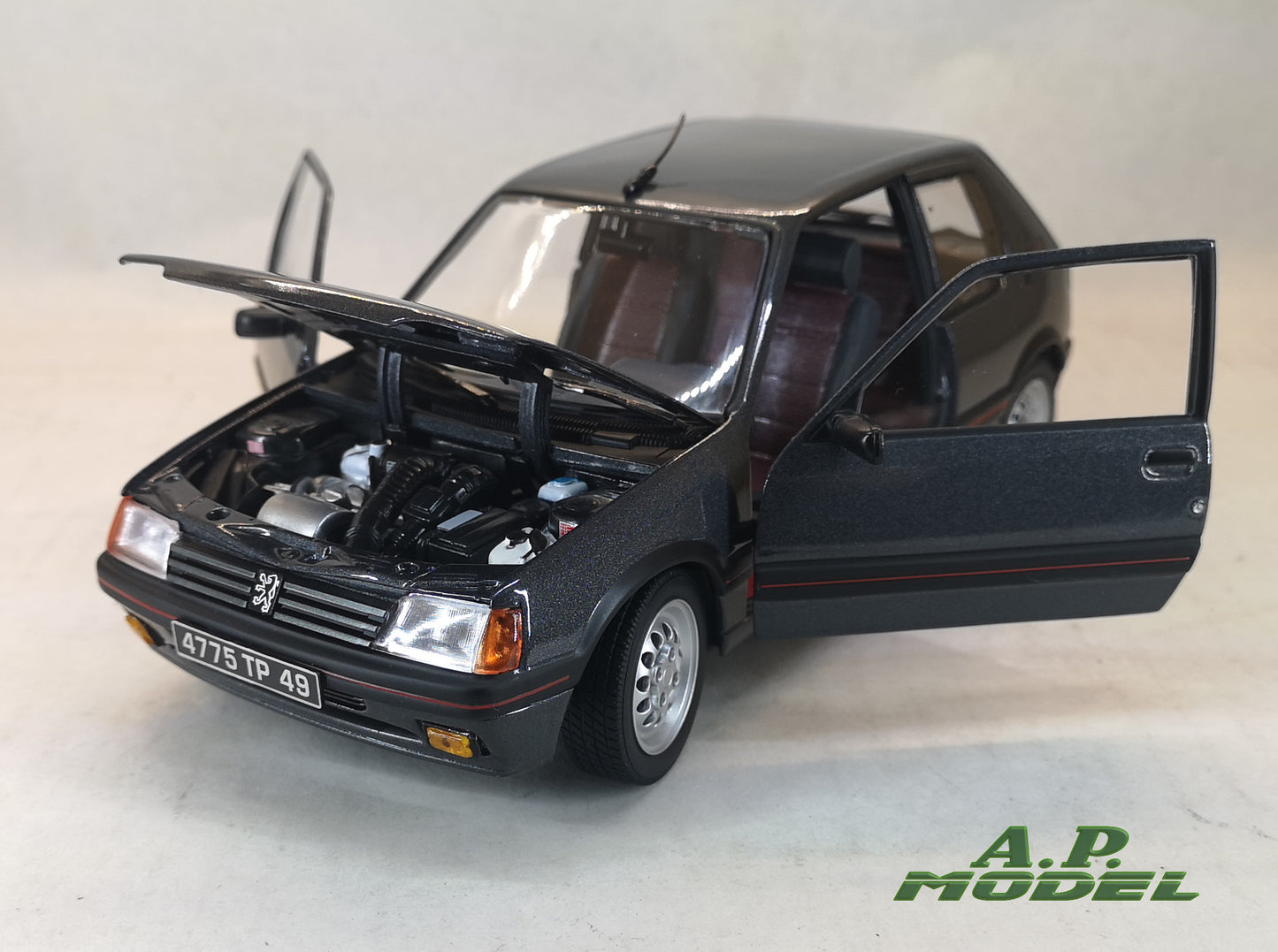 modellino auto 1:18 Peugeot 205 1.6 gti del 1988 modellini diecast della norev