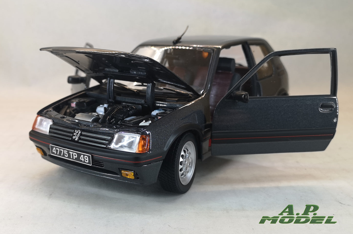 modellino auto 1:18 Peugeot 205 1.6 gti del 1988 modellini diecast della norev