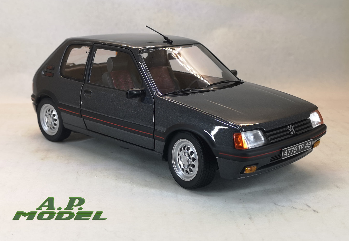 modellino auto 1:18 Peugeot 205 1.6 gti del 1988 modellini diecast della norev