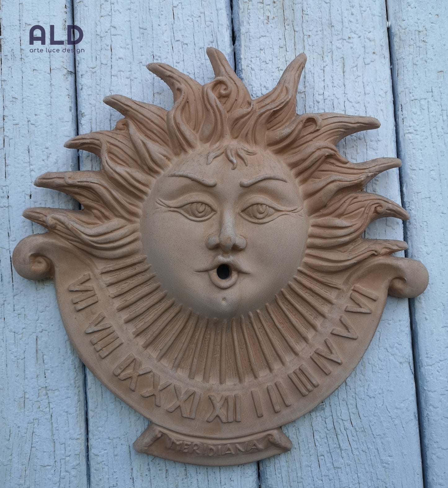 Meridiana romana in terracotta fregio murale decorazione sole da parete